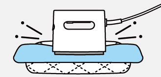 アイロン面を押し当てて
