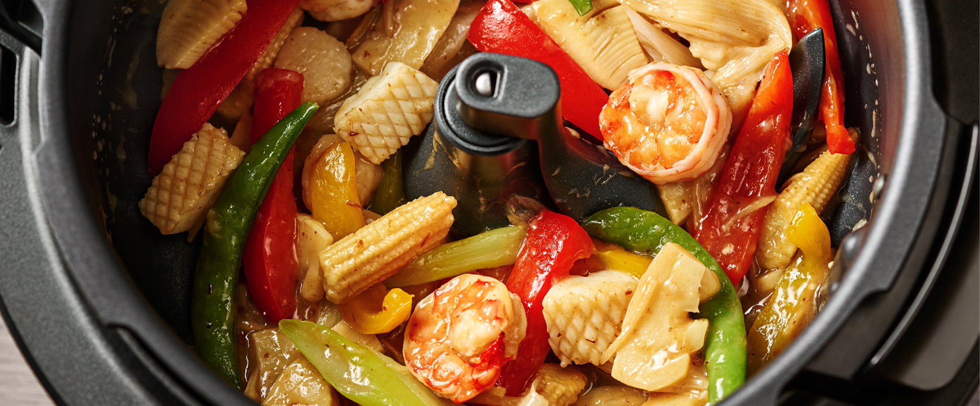 写真：オートクッカーでの炒め調理