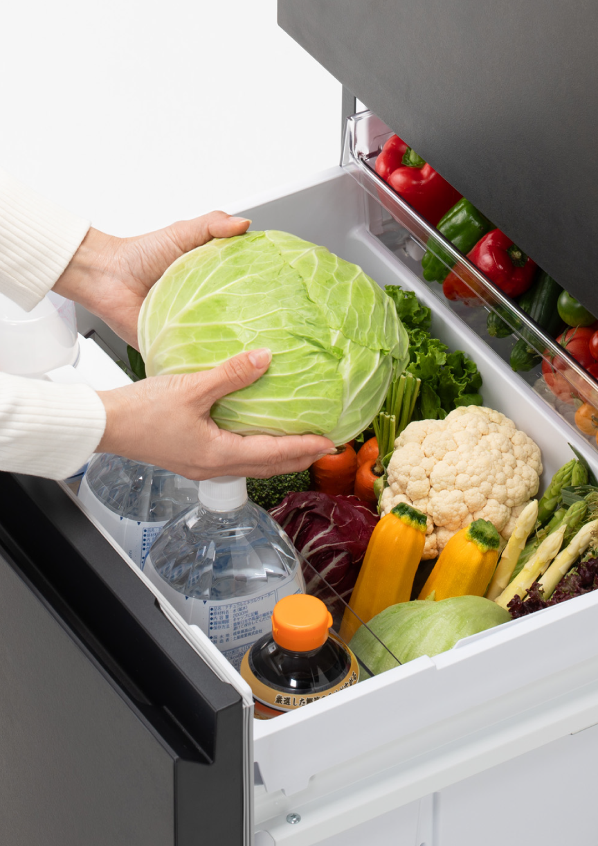 画像：野菜室を引き出しているイメージ