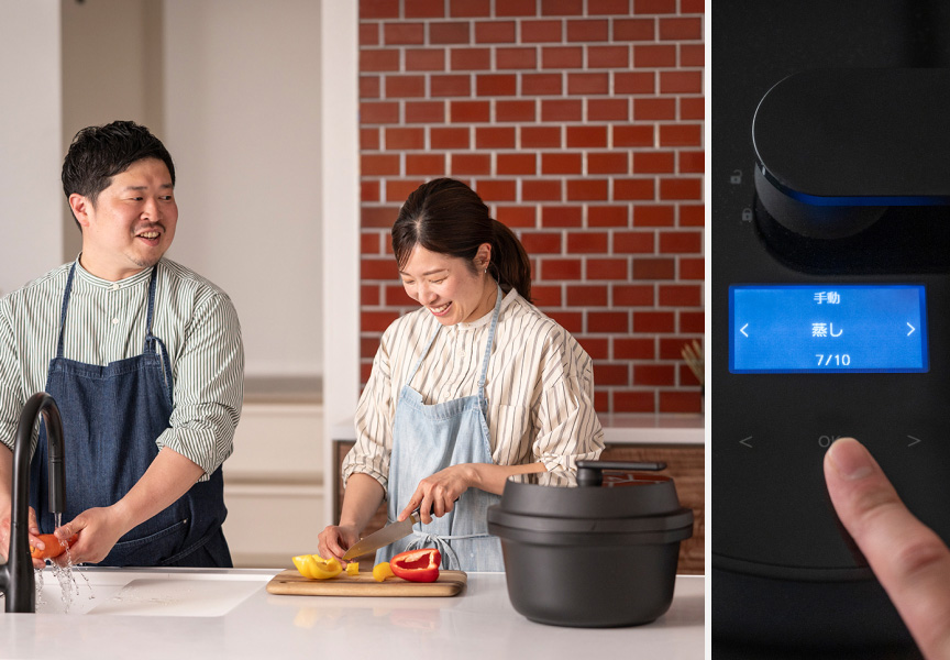 写真：調理中のぐっち夫婦