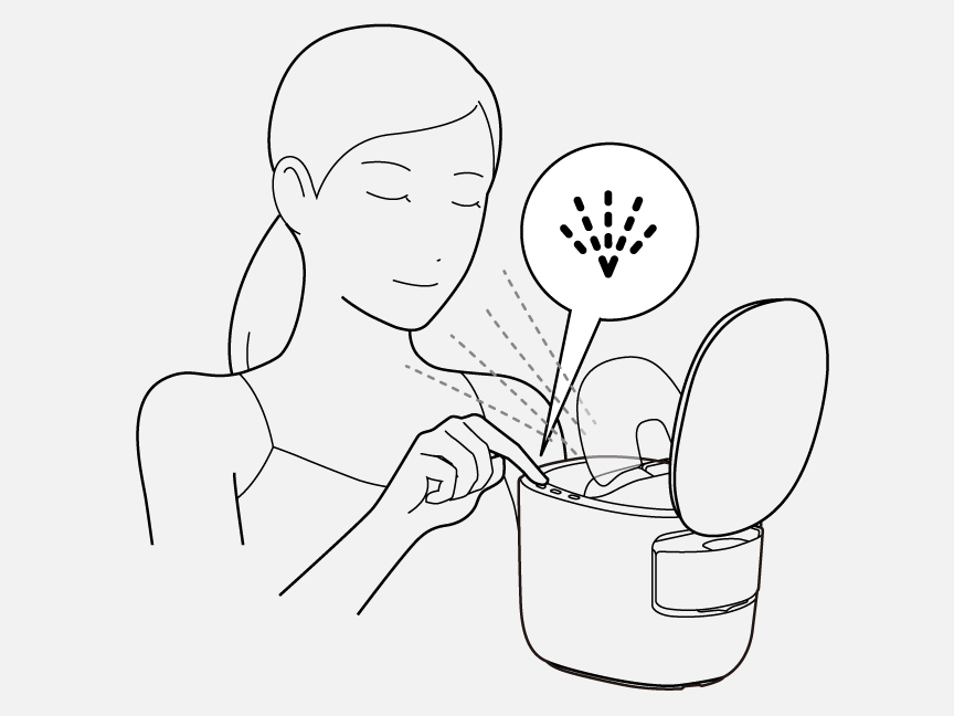 イラスト：ミストボタンを押して化粧水ミストをあてる