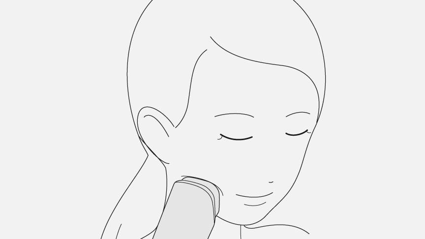 イラスト：機器を肌にあてている様子