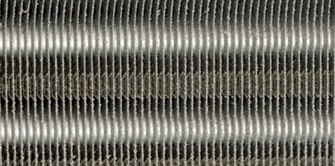 熱交換器がコーティングによってキレイに保たれているイメージ画像です。