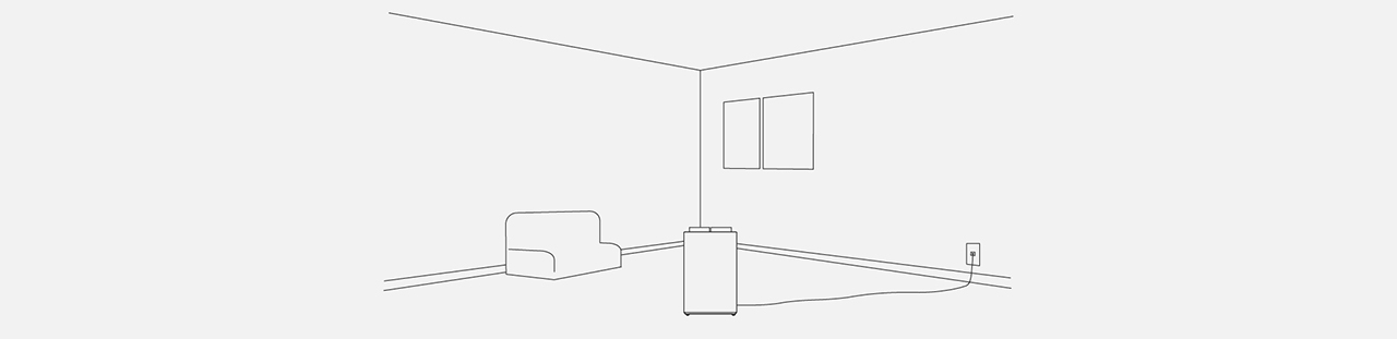 コードが長いため、部屋の中央に除湿機が置けている画像です