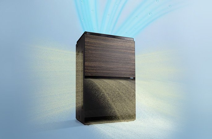 空気清浄機が花粉を含んだ空気を本体上部から吸いこみ、綺麗な空気を3方向（側面2方向と前面）に吹き出すイメージ画像です