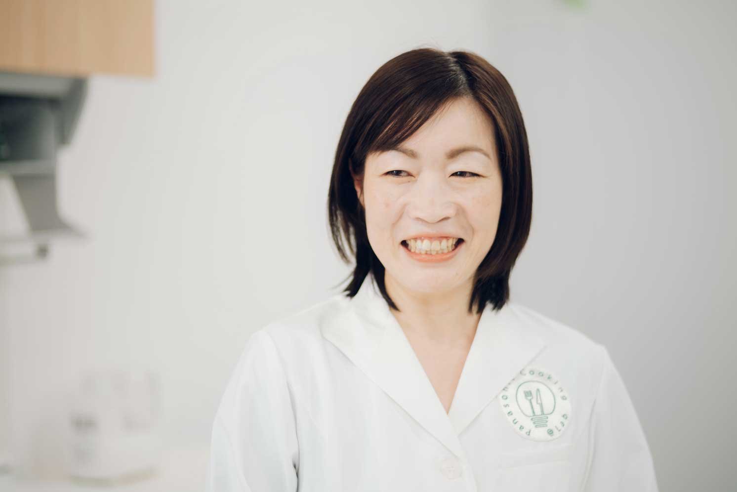 インタビューを受ける広田起子さんの写真
