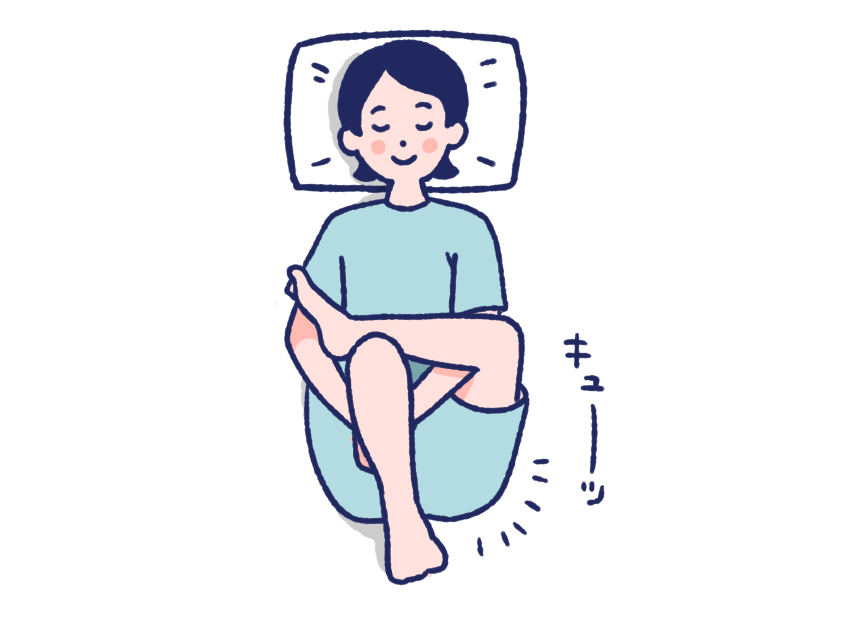 仰向けで片方の足首を逆側の膝にのせている女性