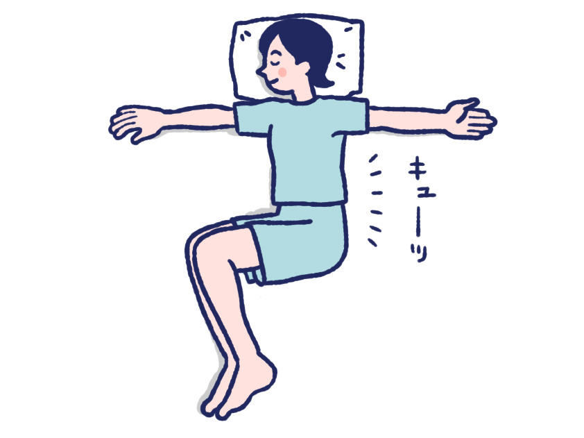 腰ひねりストレッチをしている女性