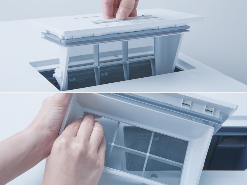 写真：乾燥フィルターに付いた水滴を拭きとる様子