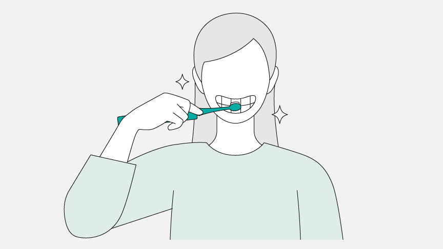 電動歯ブラシで歯を磨いているイラスト