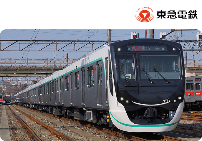 東急電鉄 田園都市線 新型車両2020系が線路を走っている画像です。画像の右上には東急電鉄のロゴがあります。