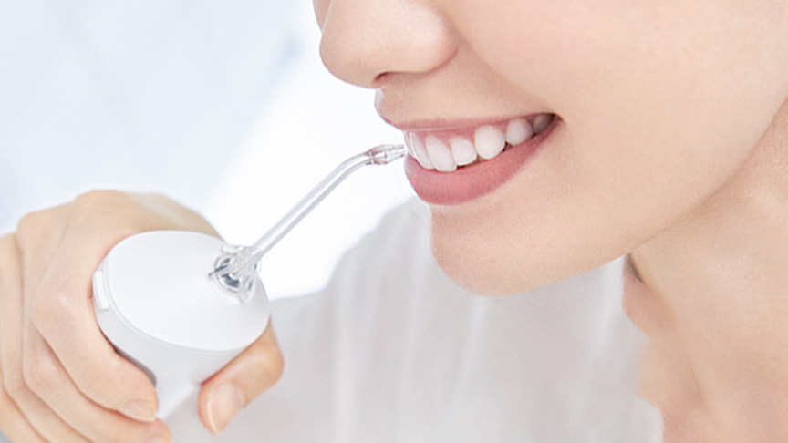 写真：ジェットウォッシャーを使用する様子