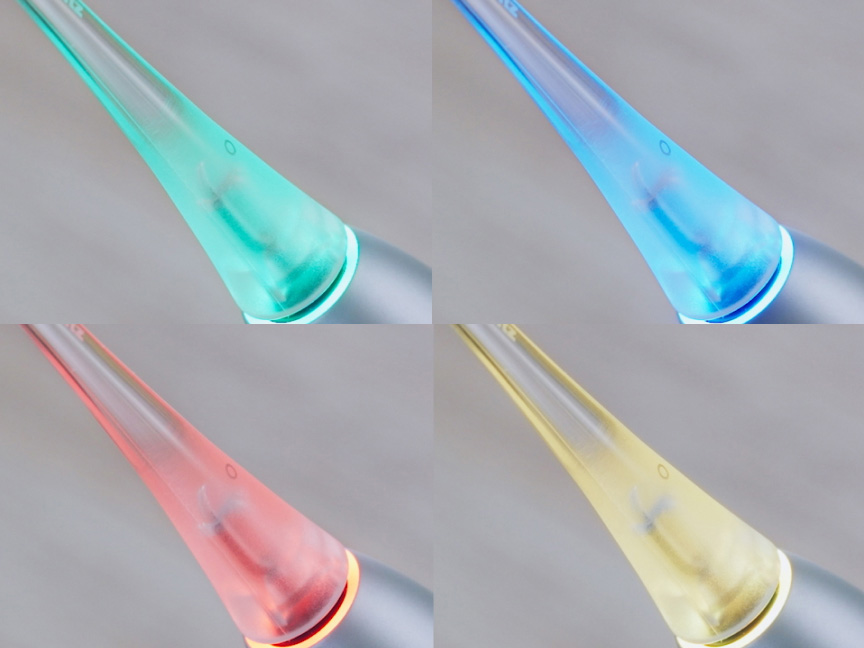 ブラッシングナビで透明ブラシが光る様子、画像には4種類の色のバリエーションが映っている