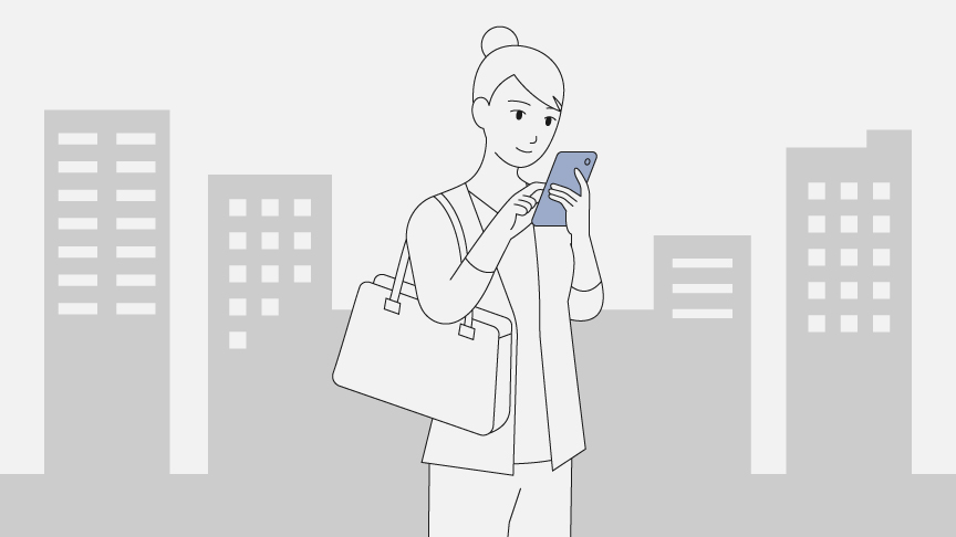 イメージ：スマホを見る女性